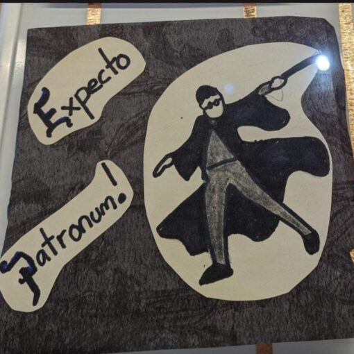 A light-up circuit tile displaying Harry Potter and the words Expecto Patronum.